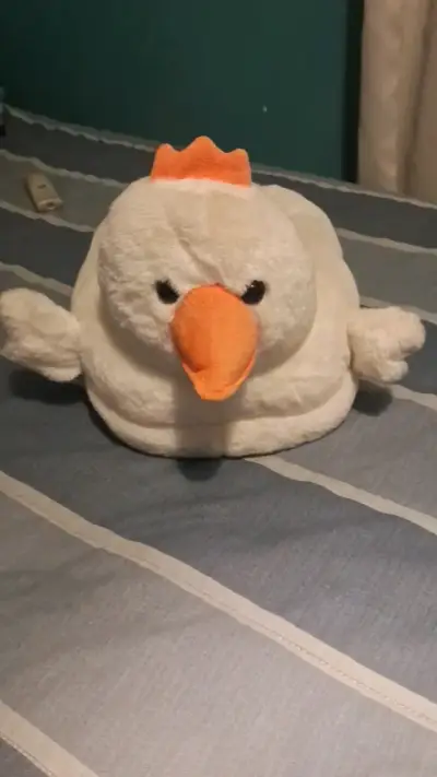 Calienta pies  de peluche en forma de pato - miniatura 1