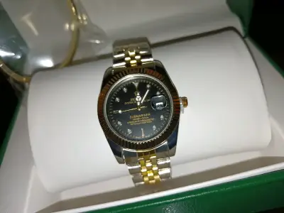 Reloj Rolex Submariner con Pulsera Dorada - miniatura 4