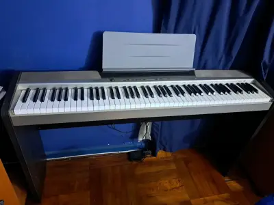 Piano digital Casio PX-120 con soporte - miniatura 1