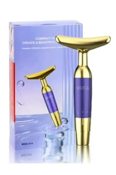 Masajeador facial vibratorio Mizge dorado y morado - miniatura 1