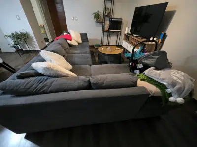 Sofá seccional gris - miniatura 2