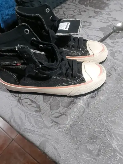 Zapatillas negras de lona Diesel para hombre - miniatura 1