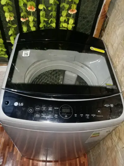 Lavadora LG de carga superior 19 kg - miniatura 1