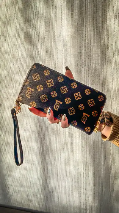 Billetera de mano con diseño floral - miniatura 1
