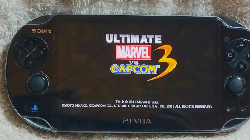 Consola portátil Sony PS Vita con juego Marvel vs Capcom 3 - 2