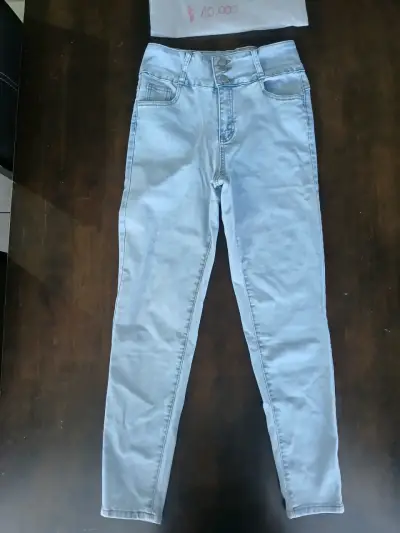 Jeans ajustados celestes para mujer - miniatura 1