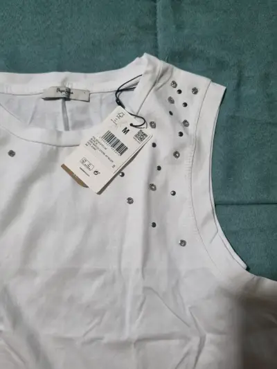 Polera sin mangas blanca con detalles brillantes - miniatura 1