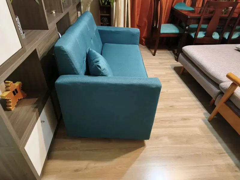 Sofá cama azul turquesa con cojín - 3