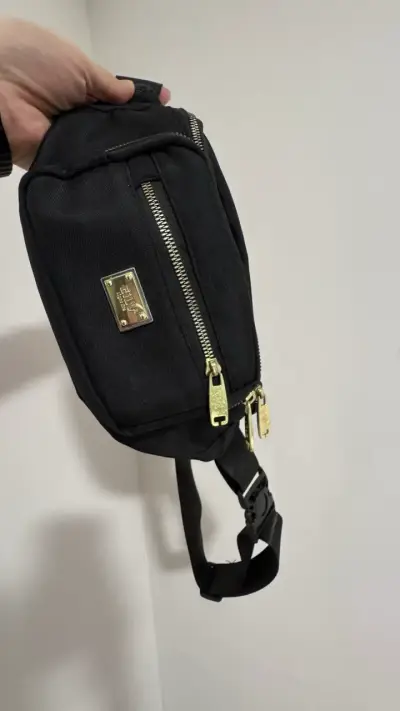 Bandolera negra con detalles dorados - miniatura 1