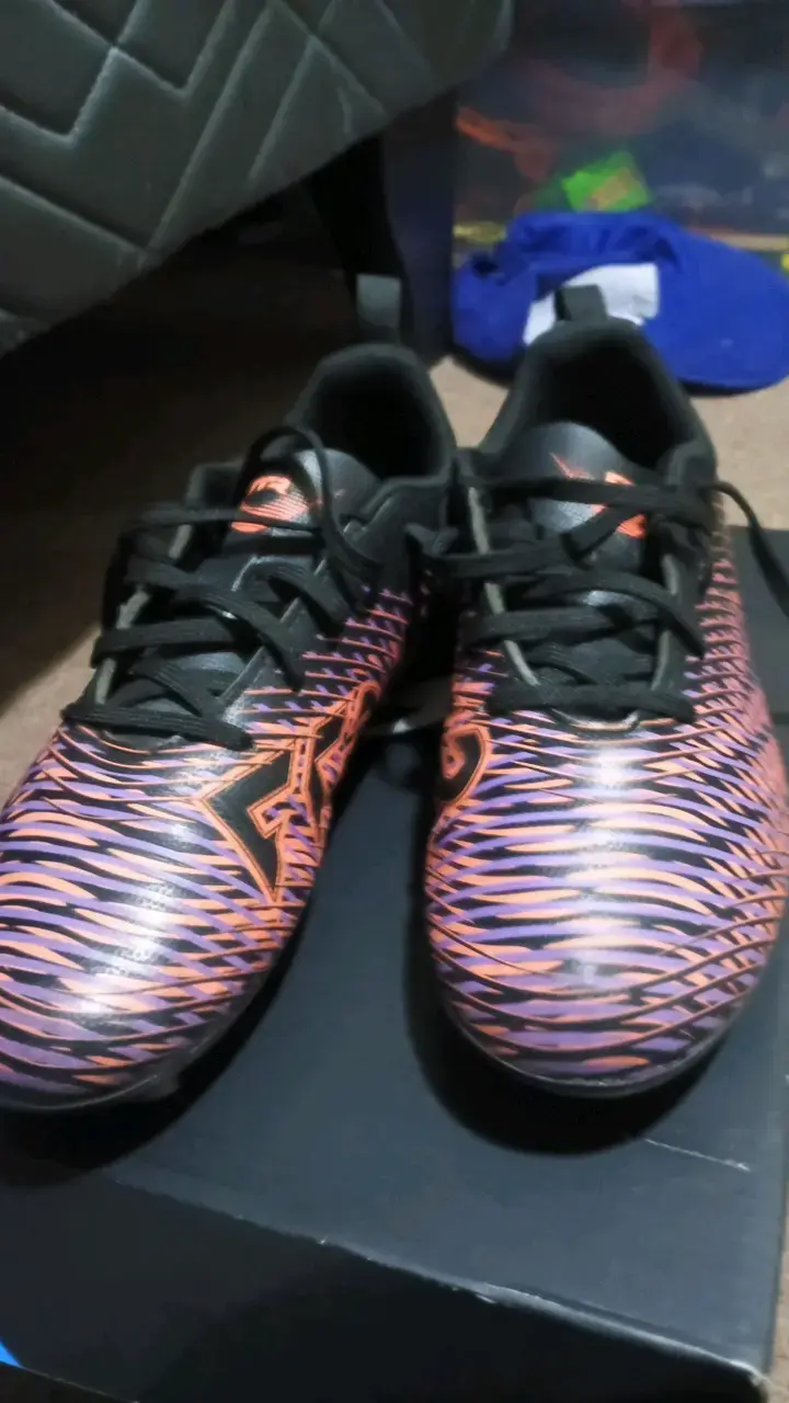 Chuteadores de fútbol Puma Future negras y naranja - 1