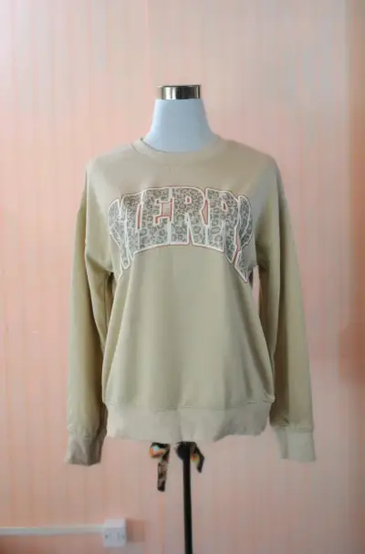 Polerón beige con estampado 'Merry' - miniatura 1