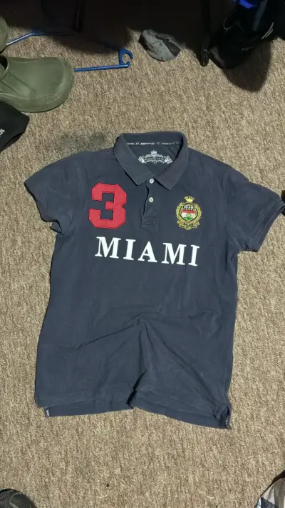 Polera Polo Azul con Número y Logo - miniatura 1