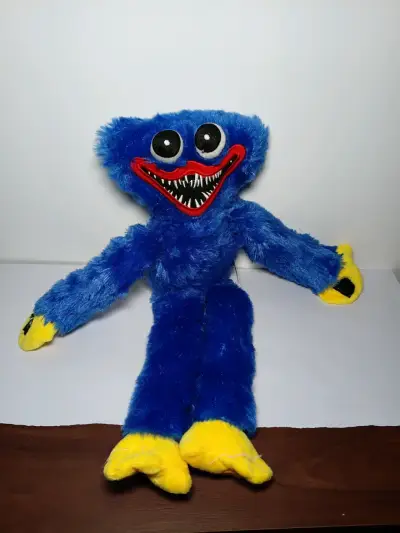 Peluche Huggy Wuggy azul y amarillo - miniatura 1