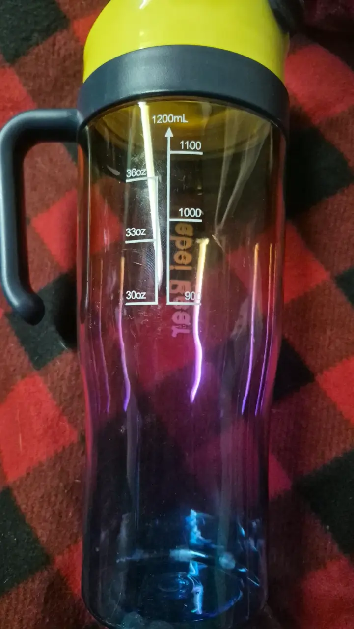 Botella medidora de 1200 ml con tapa amarilla - 2
