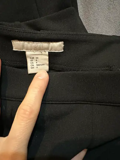 Pantalones acampanados negros talla 34 - miniatura 2