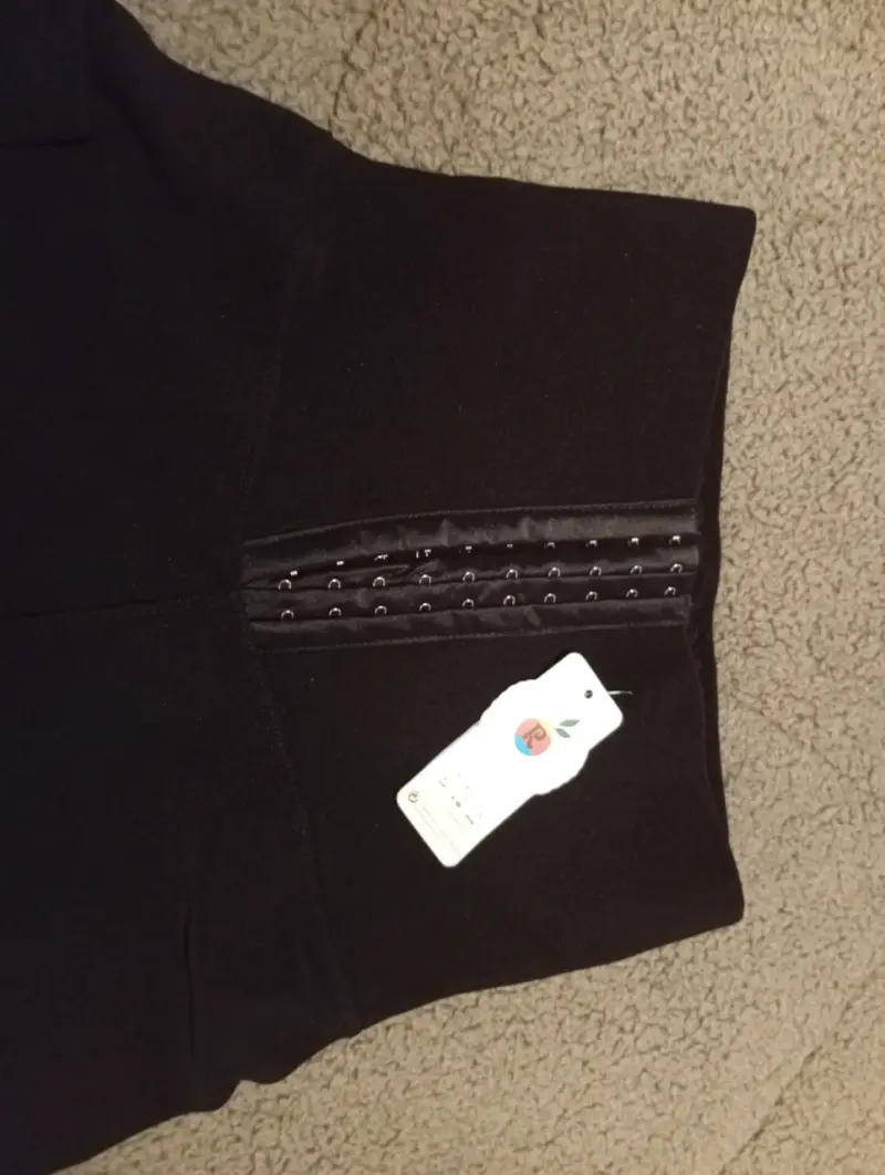 Leggings negros con cintura alta y broches - 2