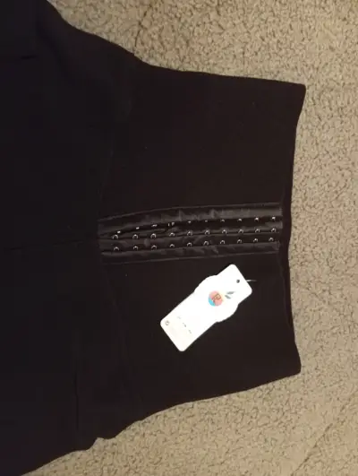 Leggings negros con cintura alta y broches - miniatura 2
