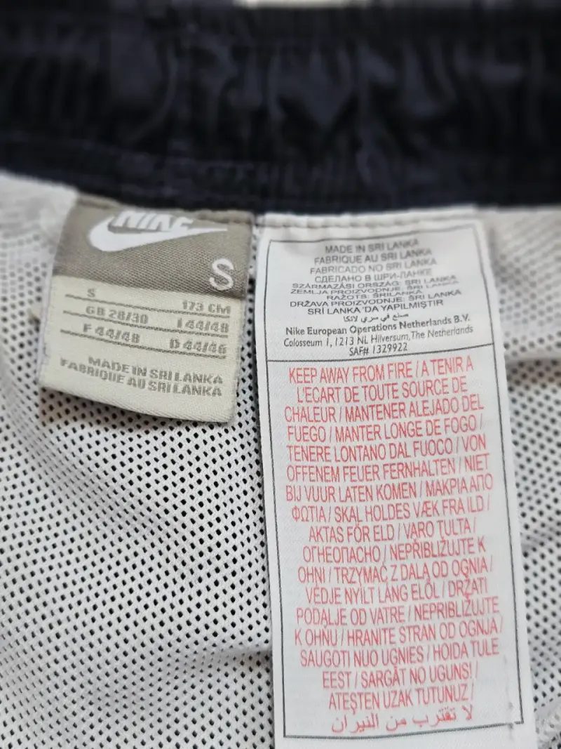 Pantalones deportivos Nike negros unisex - 4