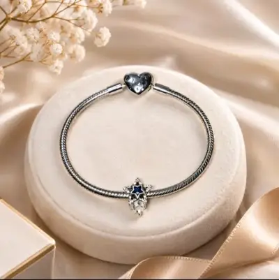 Pulsera de plata con dije de corazón y estrella - miniatura 2