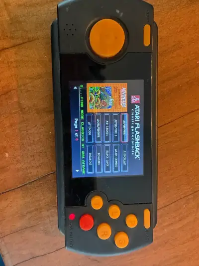Consola portátil Atari Flashback con juegos clásicos - miniatura 1