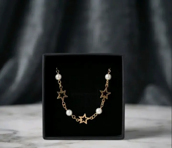 Pulsera de estrellas con perlas