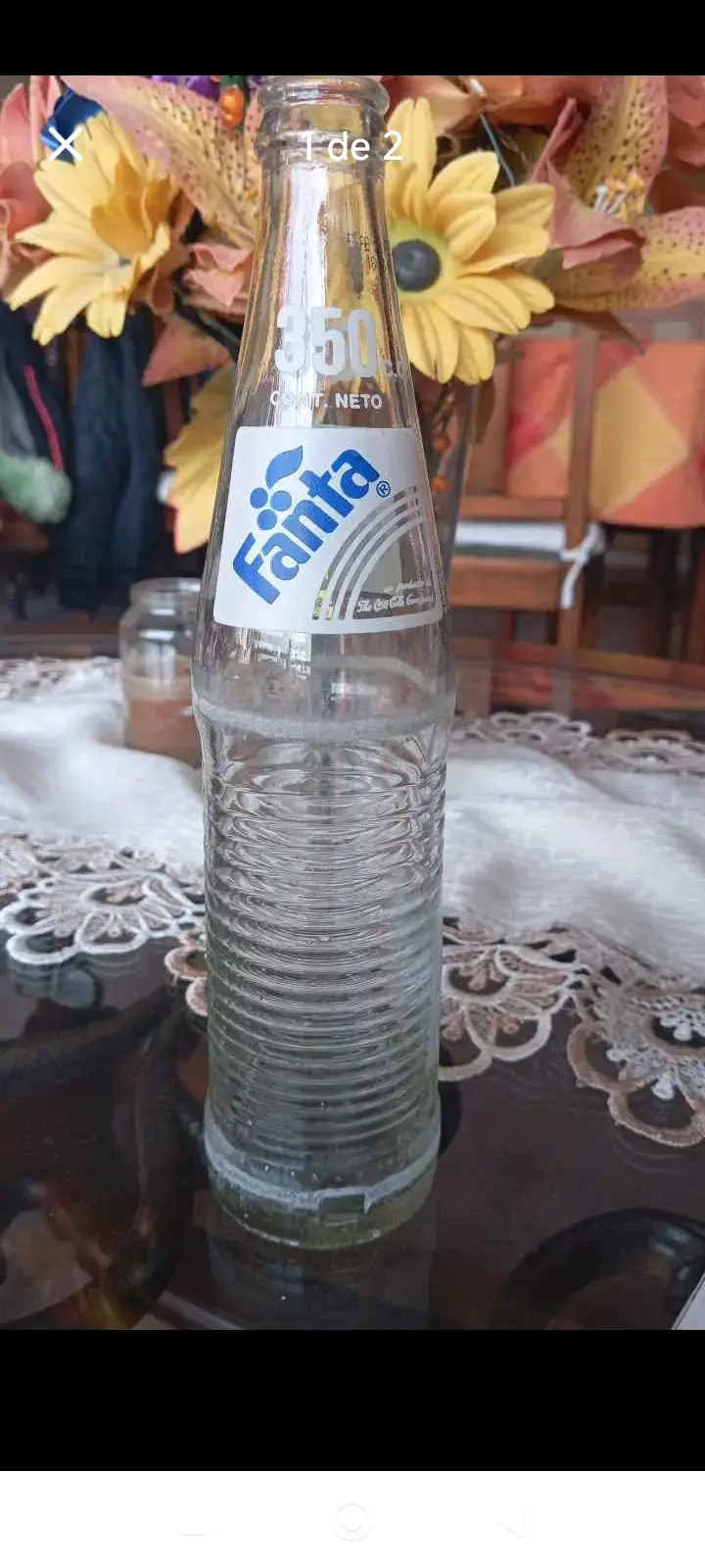 Botella de vidrio Fanta vacia vintage año 90