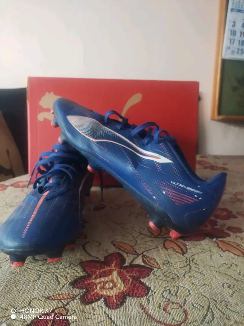 Botines de fútbol Puma Ultra azules - 1