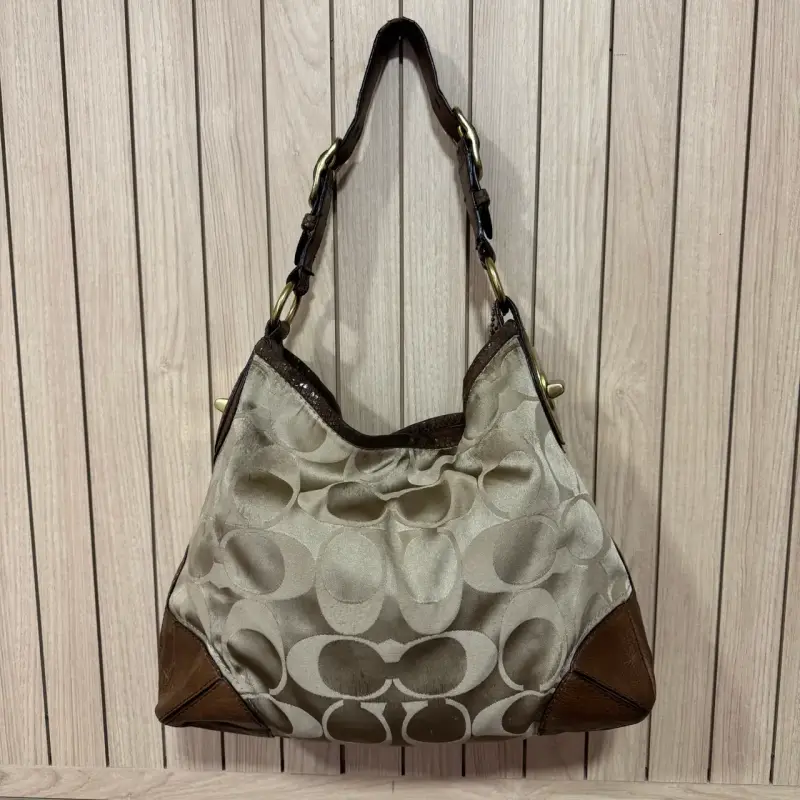 Bolso de hombro Coach beige con detalles marrones - 1