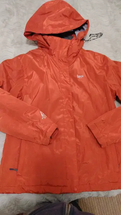 Chaqueta impermeable naranja Lippi con capucha - miniatura 1