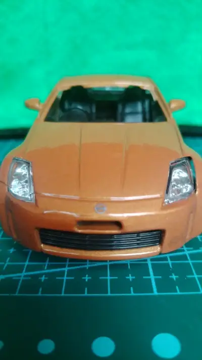 Auto a escala Nissan 350Z color cobre - miniatura 2