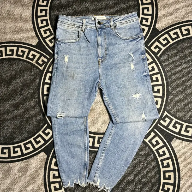 Jeans desgastados de mezclilla azul Zara Man - 1