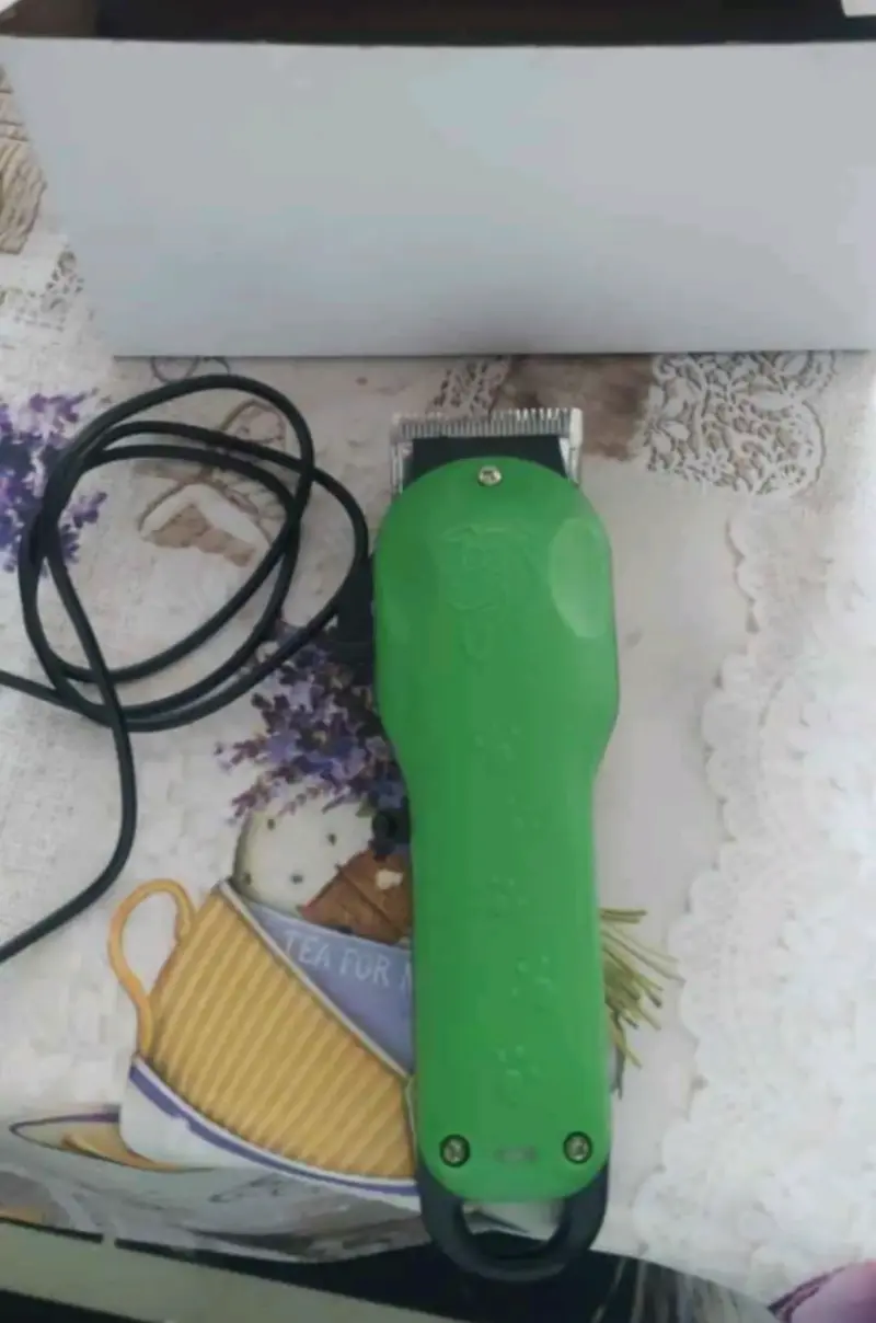 Máquina cortapelo eléctrica verde para mascotas
