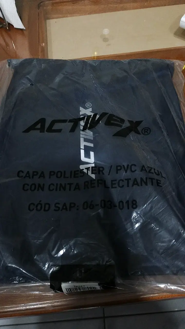 Poncho impermeable azul con cinta reflectante Activex - 1