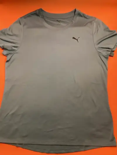 Polera deportiva turquesa Puma DryCell para mujer - miniatura 1