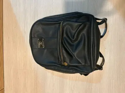 Bolso Pañalera 100%cuero - miniatura 1