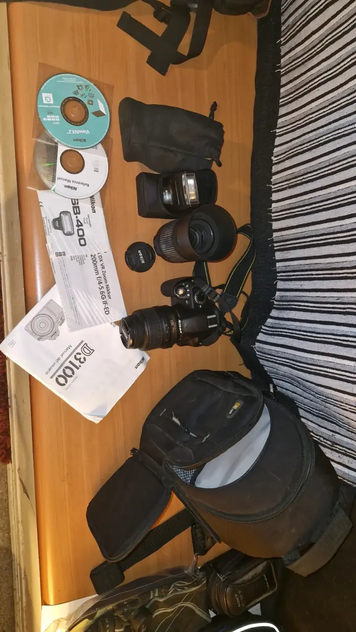 Cámara Nikon D3100 con accesorios y 3332 disparos - 1
