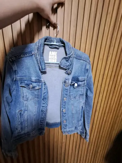Chaqueta de mezclilla azul para mujer - miniatura 1