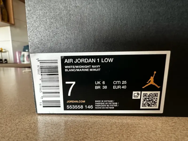 Zapatillas Air Jordan 1 Low Blancas y Azul Marino - 2