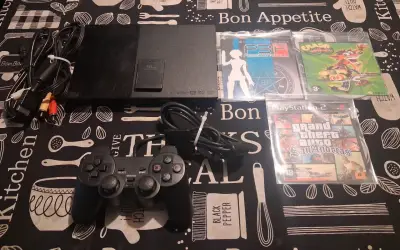 Consola PlayStation 2 Slim con juegos y accesorios - miniatura 1