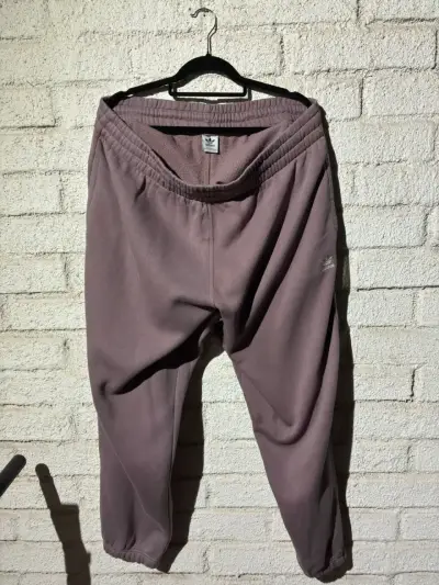 Pantalones deportivos Adidas color lila para mujer - miniatura 2