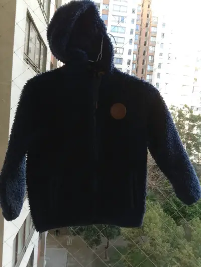 Chaqueta de lana con capucha azul para niños - miniatura 1