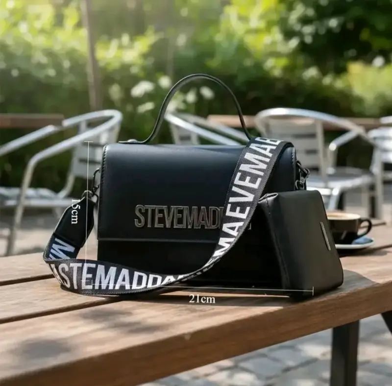 Bolso negro Steve Madden con correa ajustable - 1