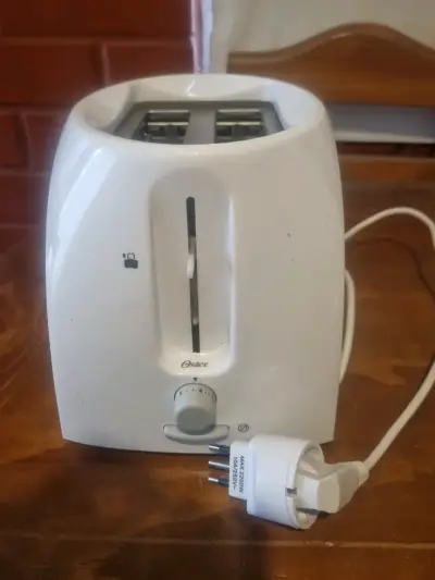 Tostadora eléctrica Oster blanca - miniatura 1