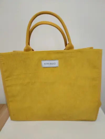 Bolso tote amarillo Nina Ricci elegante - miniatura 1