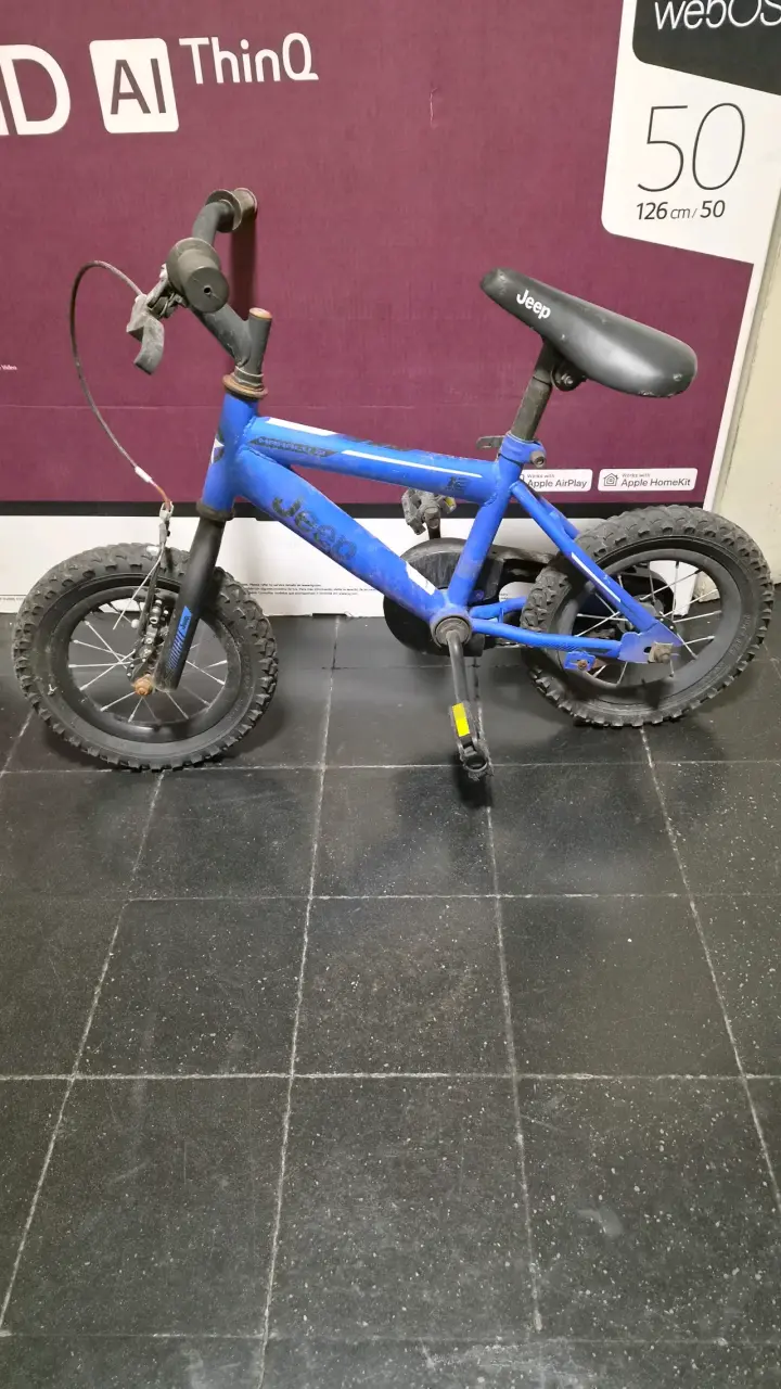 Bicicleta infantil Jeep azul con ruedas laterales