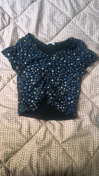 Polera de mujer con estampado de estrellas - miniatura 1