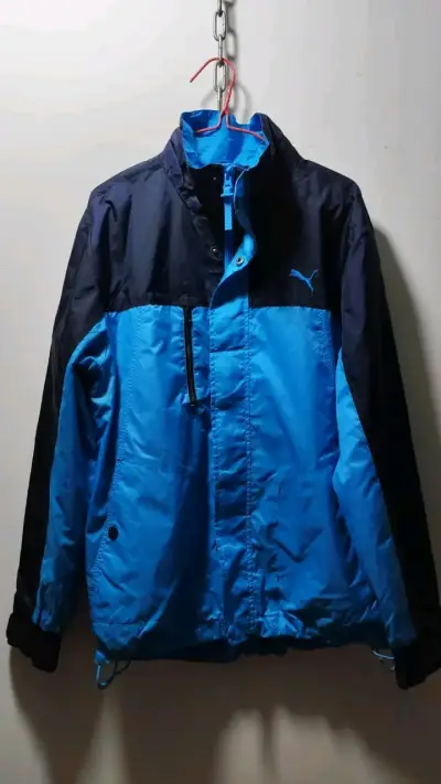 Chaqueta deportiva azul y negra Puma - miniatura 1