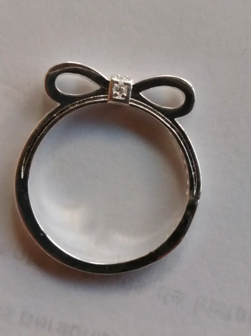 Anillos de plata con diseño de lazo y corazón - 4