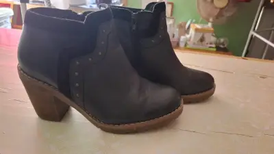 Botines de cuero negro con tacón para mujer - miniatura 1