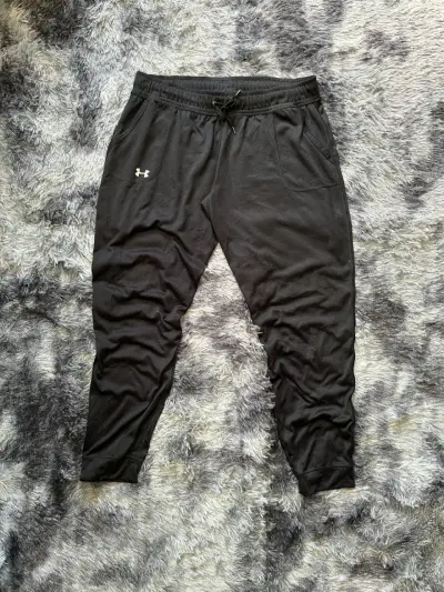Pantalones deportivos negros Under Armour - miniatura 1